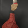 sculpture d'Elise Geoffrion Série " Semeurs de Rêves " H 45 / L 21 / P 21 cms Poids : 1 kg Grès blanc avec un four d'enfumage. Roche volcanique cueillie dans le Parc Naturel du Haut Languedoc. Laine feutrée et vernie.