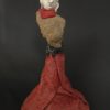 sculpture d'Elise Geoffrion Série " Semeurs de Rêves " H 45 / L 21 / P 21 cms Poids : 1 kg Grès blanc avec un four d'enfumage. Roche volcanique cueillie dans le Parc Naturel du Haut Languedoc. Laine feutrée et vernie.