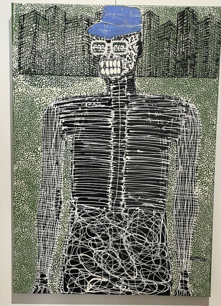 toile peinte de Patricorel de la série Génération décarbonnée qui représente un homme au regard vers la gauche