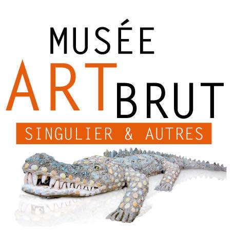 logo du musée d'art brut de Montpellier avec un crocodile
